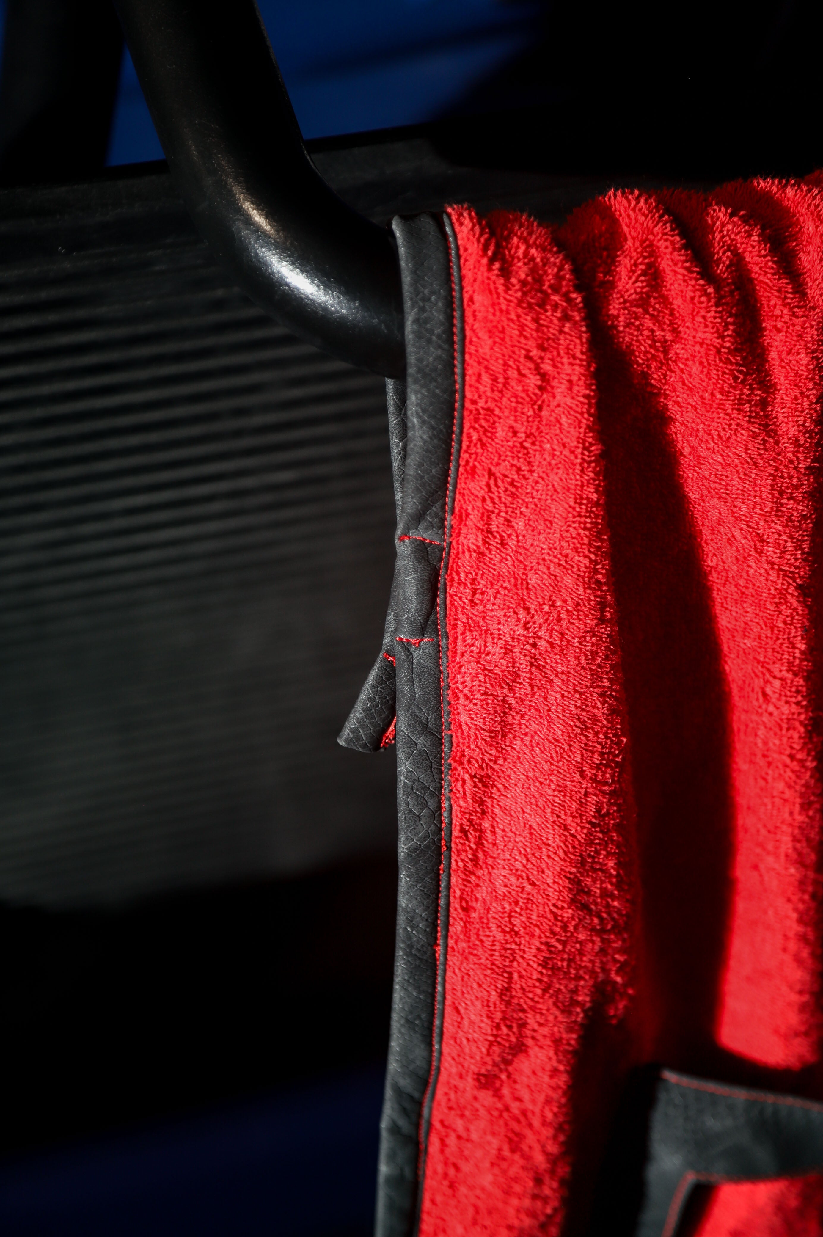 Close-up of a red textured object with a black border.